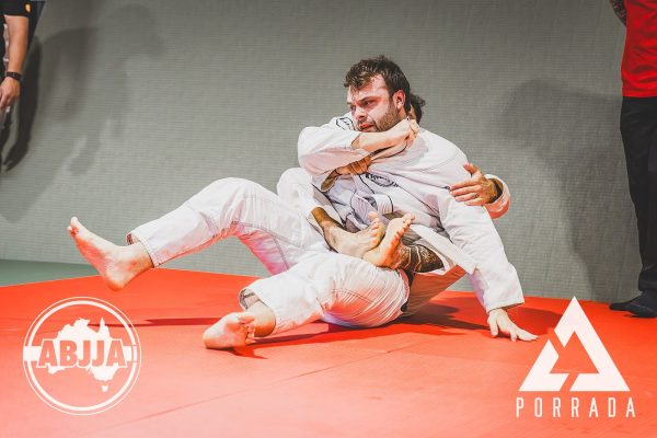 Porrada_White-Belt-Over-75kg-_-Fernando-Abreu-Pacheco-BJJ-vs-Liam-Garman-MyBJJ098_20260418_154024