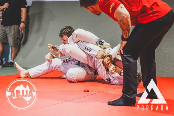 Porrada_White-Belt-Over-75kg-_-Fernando-Abreu-Pacheco-BJJ-vs-Liam-Garman-MyBJJ100_20260418_154041